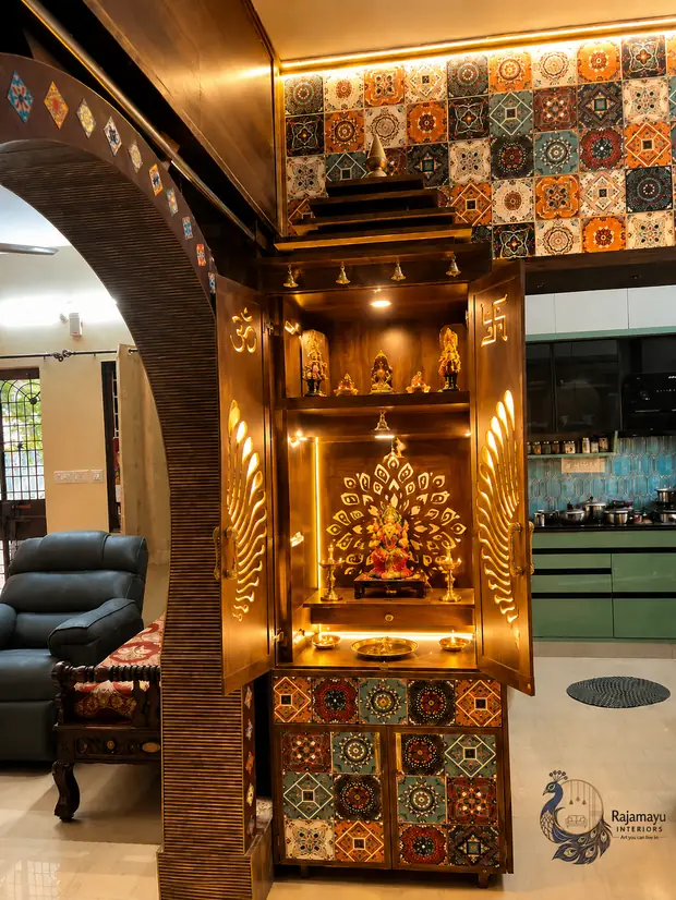 Pooja unit framed by a tiled arch