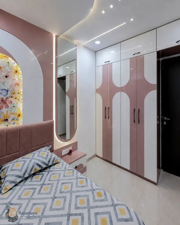Arched wardrobe in blush and ivory