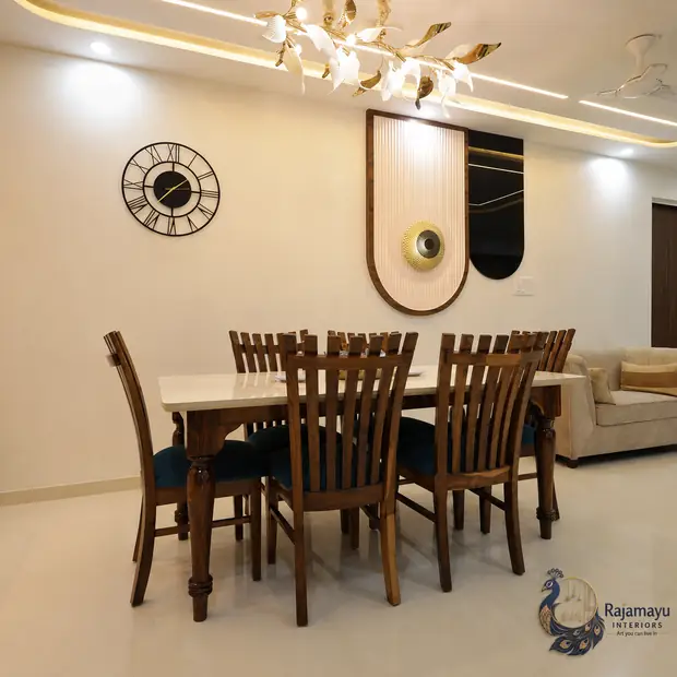 Dining with chandelier and feature ceiling