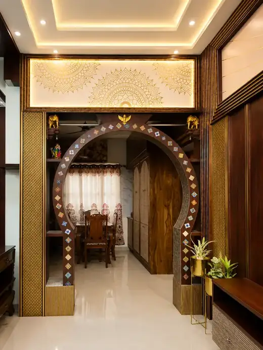 Arched partition with cove-lit ceiling